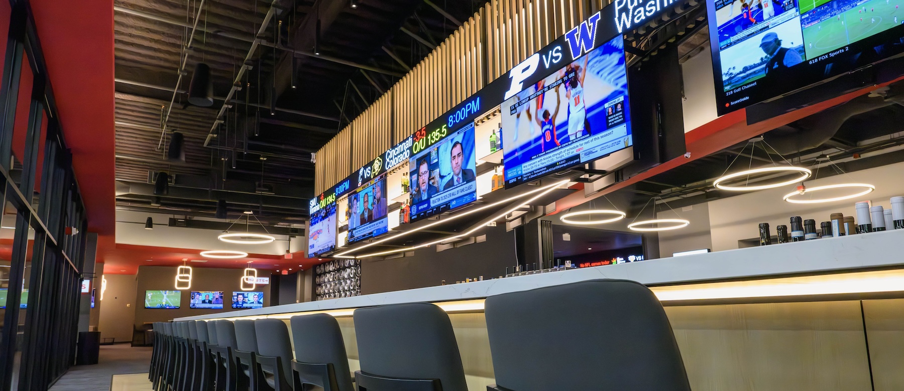 Bosse Sports Lounge bar with various digital screens and full service bar.